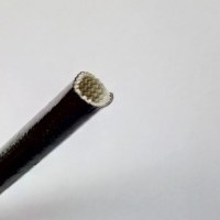 Zaščita za kable in vodnike s steklenimi vlakni in silikonskim ovojem